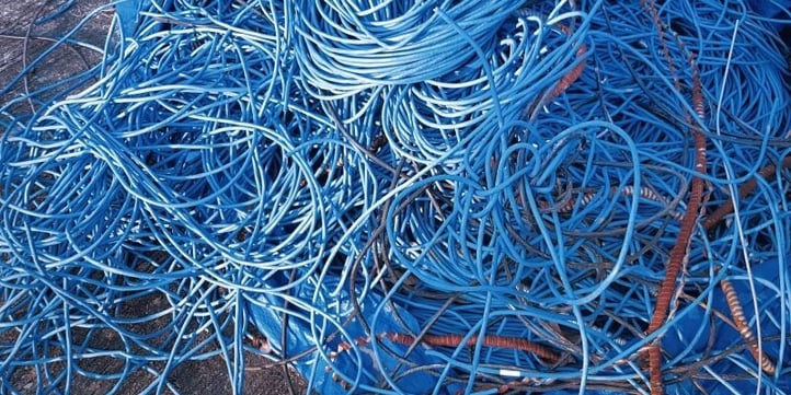 pile-of-messy-blue-tangled-electrical-cables-2024-05-30-21-57-18-utc